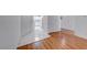 Inviting living space that showcases wood floors transitioning into the tiled kitchen, highlighting the open layout at 3125 N Buffalo Dr # 1136, Las Vegas, NV 89128