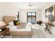 Inviting bedroom with serene lake views, modern decor, and comfortable furnishings at 32 Grand Corniche Dr, Henderson, NV 89011