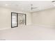 Large bonus room with tile floors and sliding glass doors at 32 Grand Corniche Dr, Henderson, NV 89011