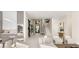 Inviting foyer with soaring ceilings, contemporary staircase, and stylish decor, adjacent to the kitchen at 32 Grand Corniche Dr, Henderson, NV 89011