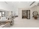 Open-concept living space with sleek design, featuring modern decor and an adjacent dining area at 32 Grand Corniche Dr, Henderson, NV 89011