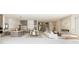 Bright and airy living space with a modern kitchen, dining area, and comfortable seating arrangement at 32 Grand Corniche Dr, Henderson, NV 89011
