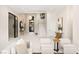 Bright and airy living room with soaring ceilings, modern furnishings, and elegant decor at 32 Grand Corniche Dr, Henderson, NV 89011