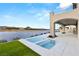 Luxury pool and spa with lake view and outdoor patio at 32 Grand Corniche Dr, Henderson, NV 89011