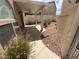 Backyard patio area with a covered ceiling, landscaping, and fencing at 3331 Cheltenham St, Las Vegas, NV 89129