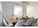 Bright dining area featuring modern table decor, stylish chairs, and an open view to the kitchen at 3331 Cheltenham St, Las Vegas, NV 89129