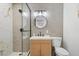 Contemporary bathroom with glass shower and stone countertops at 3492 Edison Ave, Las Vegas, NV 89121