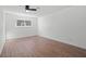 Bright bedroom features wood floors and a large window at 3492 Edison Ave, Las Vegas, NV 89121