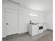 Bright laundry room with new washer and dryer and storage space at 3492 Edison Ave, Las Vegas, NV 89121
