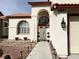 Beautiful home featuring a stucco exterior, red-tile roof, and desert landscaping at 4615 Stearman Dr, North Las Vegas, NV 89031