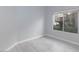 Cozy bedroom featuring neutral walls, light-colored floors, and natural light at 4820 Grey Wolf Ln # 101, Las Vegas, NV 89149