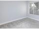 Bedroom with carpet and window at 4820 Grey Wolf Ln # 101, Las Vegas, NV 89149