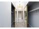 Walk-in closet with mirrored doors and ample storage space at 4820 Grey Wolf Ln # 101, Las Vegas, NV 89149