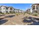 Well-maintained condo complex with desert landscaping and walking paths at 4820 Grey Wolf Ln # 101, Las Vegas, NV 89149