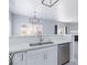 Open kitchen features stainless steel appliances and a modern countertop at 4820 Grey Wolf Ln # 101, Las Vegas, NV 89149