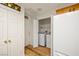 Laundry room with washer and dryer hookups next to the kitchen at 5050 Nw Valdez Ct, Pahrump, NV 89060