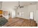 Open-concept living room with access to the kitchen, and hardwood flooring at 5050 Nw Valdez Ct, Pahrump, NV 89060