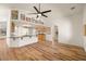 Bright living room with hardwood floors and open access to the kitchen area at 5050 Nw Valdez Ct, Pahrump, NV 89060
