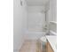 Clean bathroom with a shower-tub combination, white tile, and modern fixtures at 5265 Caspian Springs Dr # 201, Las Vegas, NV 89120