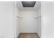 Walk-in closet with ample shelving space, ready for organizing your wardrobe at 5265 Caspian Springs Dr # 201, Las Vegas, NV 89120