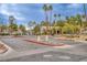 Community entrance featuring a sign that says 'Canyon Willow' surrounded by desert landscaping at 5265 Caspian Springs Dr # 201, Las Vegas, NV 89120