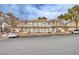 Condominium complex featuring covered parking and landscaping at 5265 Caspian Springs Dr # 201, Las Vegas, NV 89120