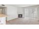 Inviting living room with a cozy fireplace and sliding glass doors to a private patio at 5265 Caspian Springs Dr # 201, Las Vegas, NV 89120
