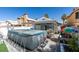 Outdoor oasis with an above-ground pool, a covered patio, and ample space for entertaining at 5309 Silverheart Ave, Las Vegas, NV 89142