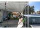 Backyard with an above-ground pool, covered patio, lounge area, and mature landscaping at 5309 Silverheart Ave, Las Vegas, NV 89142