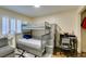 Bedroom with a cozy bunk bed, desk, and neutral colors at 5309 Silverheart Ave, Las Vegas, NV 89142