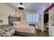 Bright bedroom with a comfy bed, stylish decor, and plenty of natural light at 5309 Silverheart Ave, Las Vegas, NV 89142