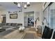 Dining area leading to the kitchen with backyard access through sliding glass doors at 5309 Silverheart Ave, Las Vegas, NV 89142
