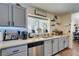 The kitchen features stainless steel appliances and ample counter space at 5309 Silverheart Ave, Las Vegas, NV 89142