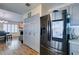 The stainless steel refrigerator is centrally located next to the pantry and dining area at 5309 Silverheart Ave, Las Vegas, NV 89142