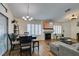 Open floor plan with living and dining areas, fireplace, and abundant natural light at 5309 Silverheart Ave, Las Vegas, NV 89142