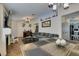 Inviting living space with a comfortable gray sectional and views of the kitchen at 5309 Silverheart Ave, Las Vegas, NV 89142