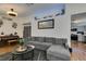 Inviting living room with modern furnishings and an open floor plan to the kitchen at 5309 Silverheart Ave, Las Vegas, NV 89142