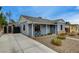 A quaint single-story home with a well-maintained exterior and extended driveway at 533 K Ave, Boulder City, NV 89005