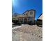 Charming two-story home with well-maintained landscaping, creating curb appeal at 5721 Heineken Dr, North Las Vegas, NV 89031