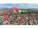 Aerial view showcasing the neighborhood, Lee Antonello Elementary school, and Eldorado Park at 5850 Grey Wood Way, North Las Vegas, NV 89031
