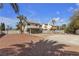 Expansive backyard featuring desert landscape, offering privacy and potential for customization at 5850 Grey Wood Way, North Las Vegas, NV 89031