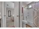 Bright bathroom featuring a shower-tub combo with a decorative shower curtain at 5850 Grey Wood Way, North Las Vegas, NV 89031