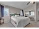 Comfortable bedroom features carpet, a queen-sized bed, and lots of closet space at 5850 Grey Wood Way, North Las Vegas, NV 89031