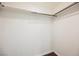 This closet is a walk-in with a wooden clothing rack at 6284 Pinewood Ave, Las Vegas, NV 89103