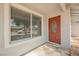 Welcoming front entrance with a decorative glass door and a large window at 6284 Pinewood Ave, Las Vegas, NV 89103