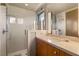 Clean, modern bathroom with glass-enclosed shower, sleek vanity, and a minimalist design aesthetic at 66 Golf Estates Dr, Las Vegas, NV 89141