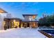 Stunning home featuring an expansive patio, luxurious lounge chairs, and a serene pool at 66 Golf Estates Dr, Las Vegas, NV 89141