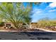 Well-maintained home featuring desert landscaping and a circular driveway, promising curb appeal at 66 Golf Estates Dr, Las Vegas, NV 89141