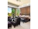 Bright main bedroom with a seating area to enjoy the landscape views at 66 Golf Estates Dr, Las Vegas, NV 89141