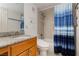 Functional bathroom featuring a shower-tub combination, stylish vanity, and granite countertops at 737 Oakmont Ave # 1202, Las Vegas, NV 89109